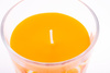 Dekokerze mit Orangenduft im Glas